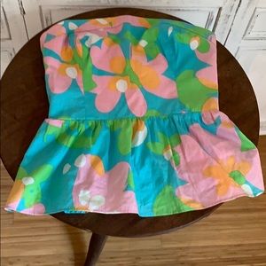 Exposed zipper peplum top